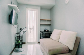 Comfort and Simply Look 1BR Apartment at Scientia Residence By Travelio